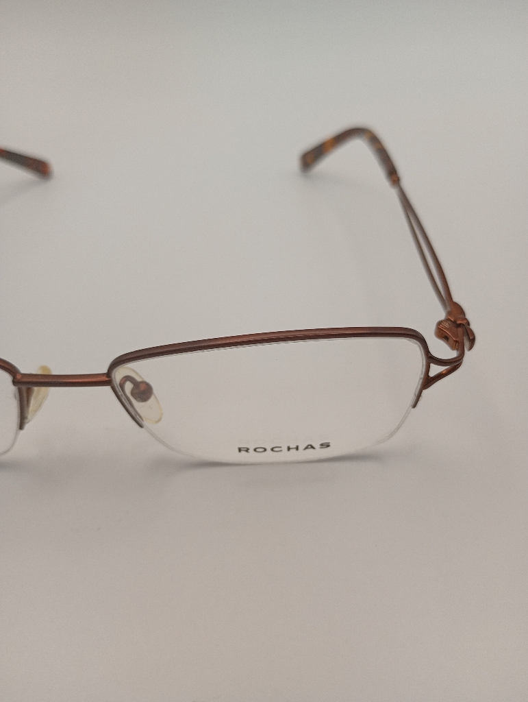 Rochas R09169/G Eyewear Eyeglasses/Prescription Clear Semi-Rimless Rectangle Unisex Standard Barrel Hinge Brown Metal, Plastic - Image 1